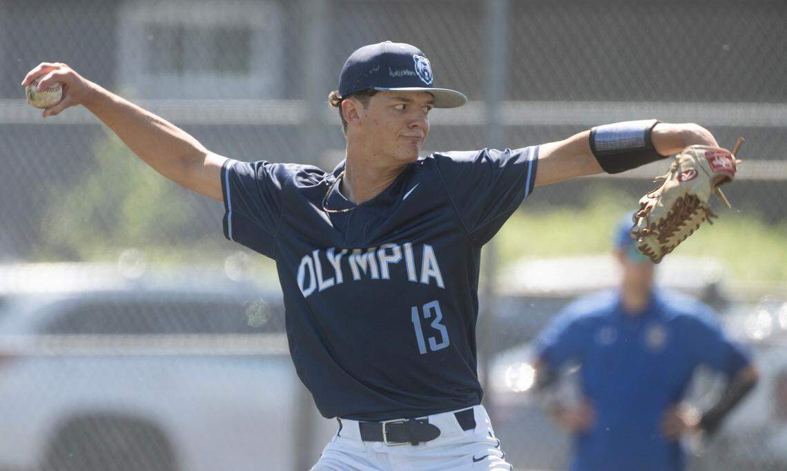 Olympia pitcher Travis Kunkel delivers during the 4A District 3/4 baseball semifinal game against the Tahoma Bears at Art Wright Field in Kent, Washington, on Saturday, May 11, 2024.