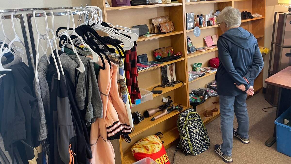 A patron peruses items for sale at Avenue Thrift in Parkland on Sept. 27, 2024.