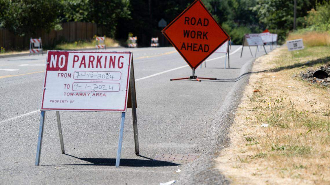 No-parking signs line sections of the road that leads into North Lake Tapps Park, on Monday, July 15, 2024, in Bonney Lake, Wash.