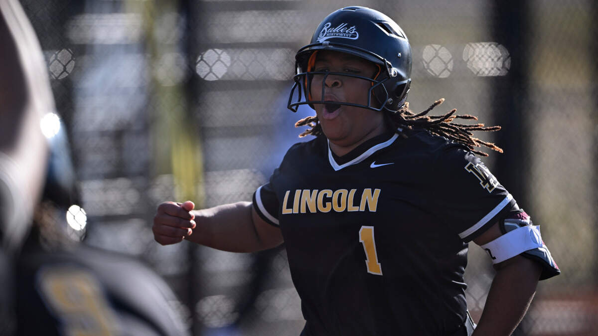 Lincoln’s Joy Wilde celebrates her three-run home run against Lakes during the game at Lincoln High School, on Tuesday, April 30, 2024, in Tacoma, Wash.