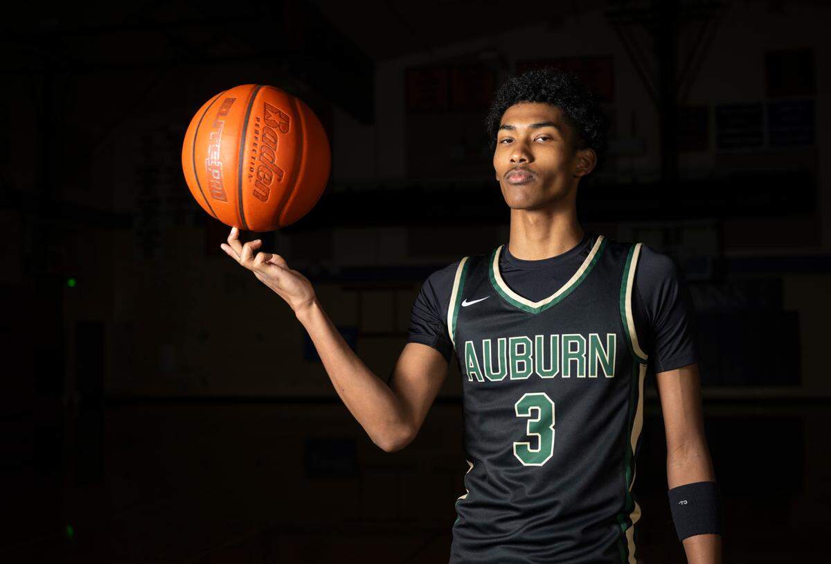The News Tribune’s 2025 All-Area boys basketball first-team selection, Auburn junior Daniel Johnson, poses for a portrait at Sumner High School, on Sunday, March 23, 2025, in Sumner.
