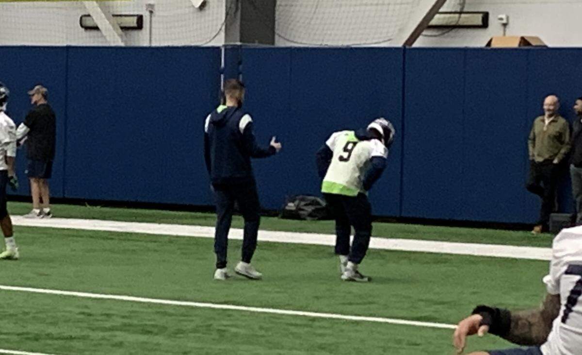 Lead running back Kenneth Walker participates in the start of Seahawks practice Friday, Dec. 22, 2023, before the team left for their Sunday game at the Tennessee Titans. Seattle listed Walker questionable to play in the game with a shoulder injury.