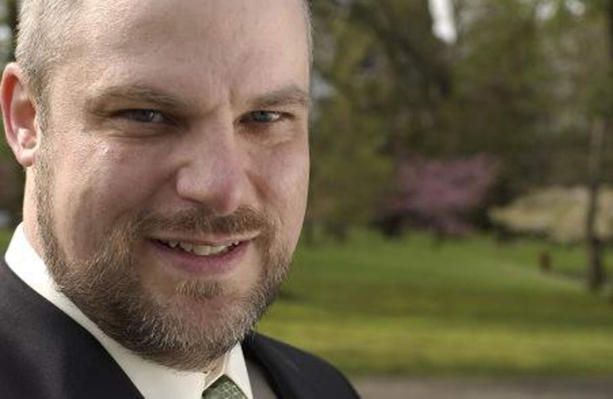 Tacoma native John Munn after he was named managing artistic director of Lakewood Playhouse in February 2012. Munn resigned in July over accusations of inappropriate conduct towards members of the theater.