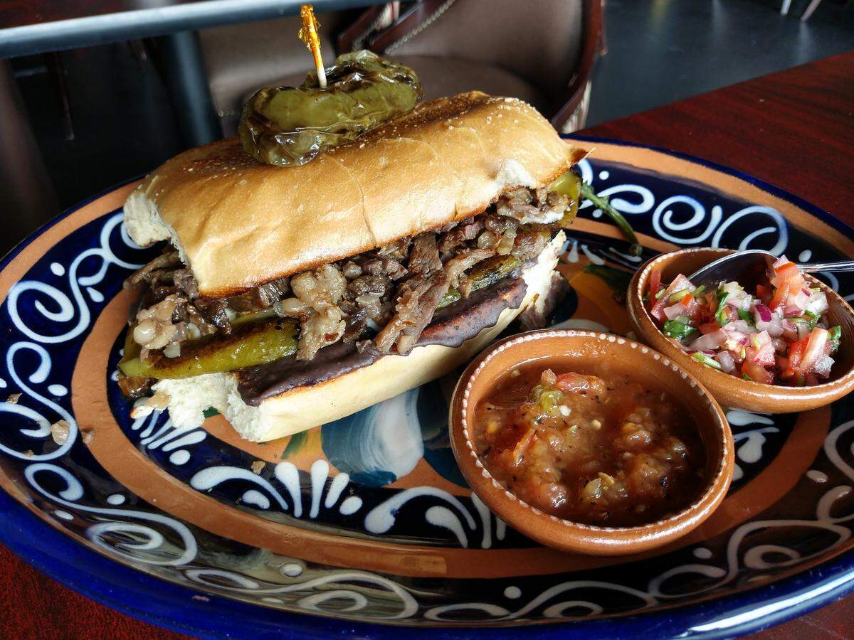A carne asada torta sandwich from Ta Carbon.