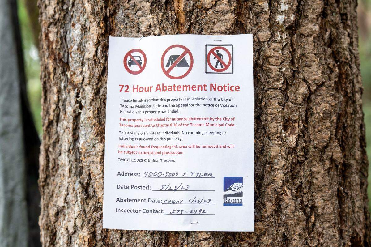 Residents of a sprawling homeless encampment were given 72-hours notice that the area around South Tyler Street would be cleared on the morning Tuesday, May 30, 2023, in Tacoma.