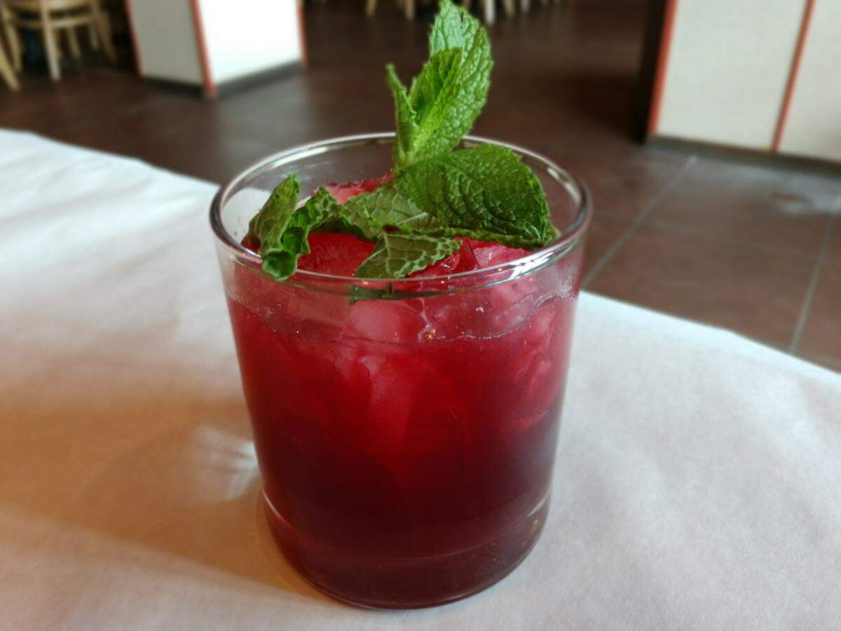The Miss Saigon cocktail with hibiscus-infused vodka at Boiling Crawfish in South Hill.