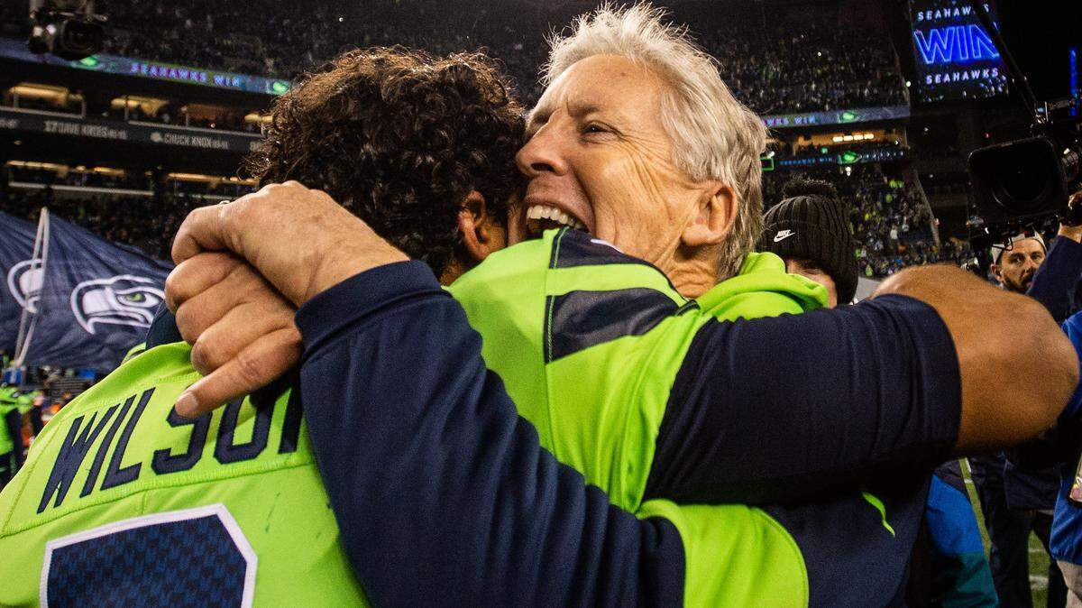 Seattle Seahawks head coach Pete Carroll and Seattle Seahawks quarterback Russell Wilson (3) celebrate after the game. The Seattle Seahawks played the Minnesota Vikings in a NFL football game at CenturyLink Field in Seattle, Wash., on Monday, Dec. 2, 2019.