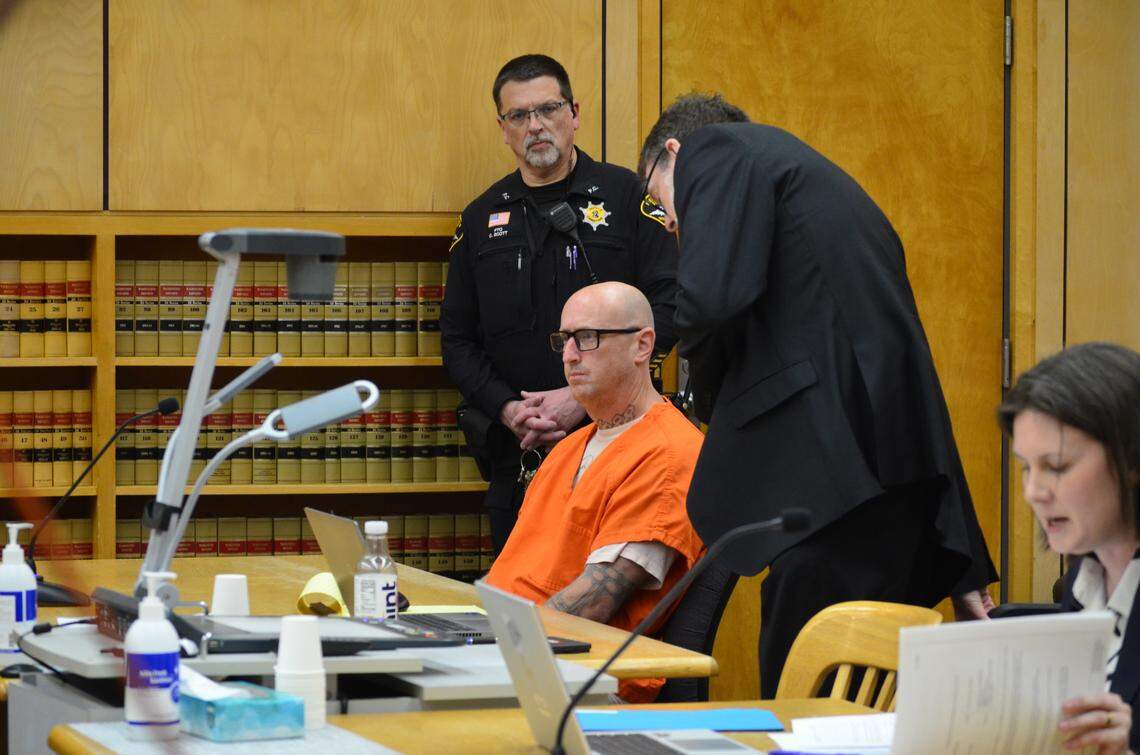 Randy Philip Capps, center, sits in Pierce County Superior Court on Friday, April 10, 2026, after receiving a new sentence for his part in the 1994 murder-for-hire plot that targeted 59-year-old Marietta Dela Cruz.