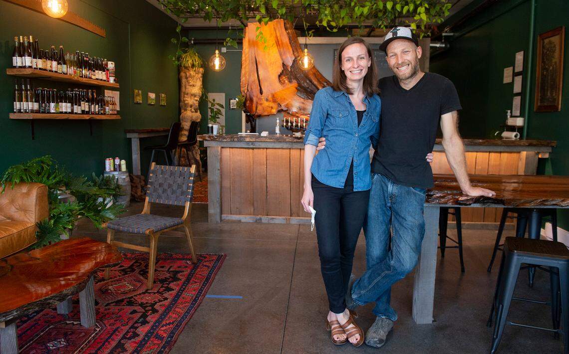 Mia Daughenbaugh and her husband Sterling Paradiso have blended their two loves - she loves cider, he loves cedar - with their new Cider & Cedar taproom and bottle shop in downtown Tacoma, shown on Thursday, Aug. 27, 2020.