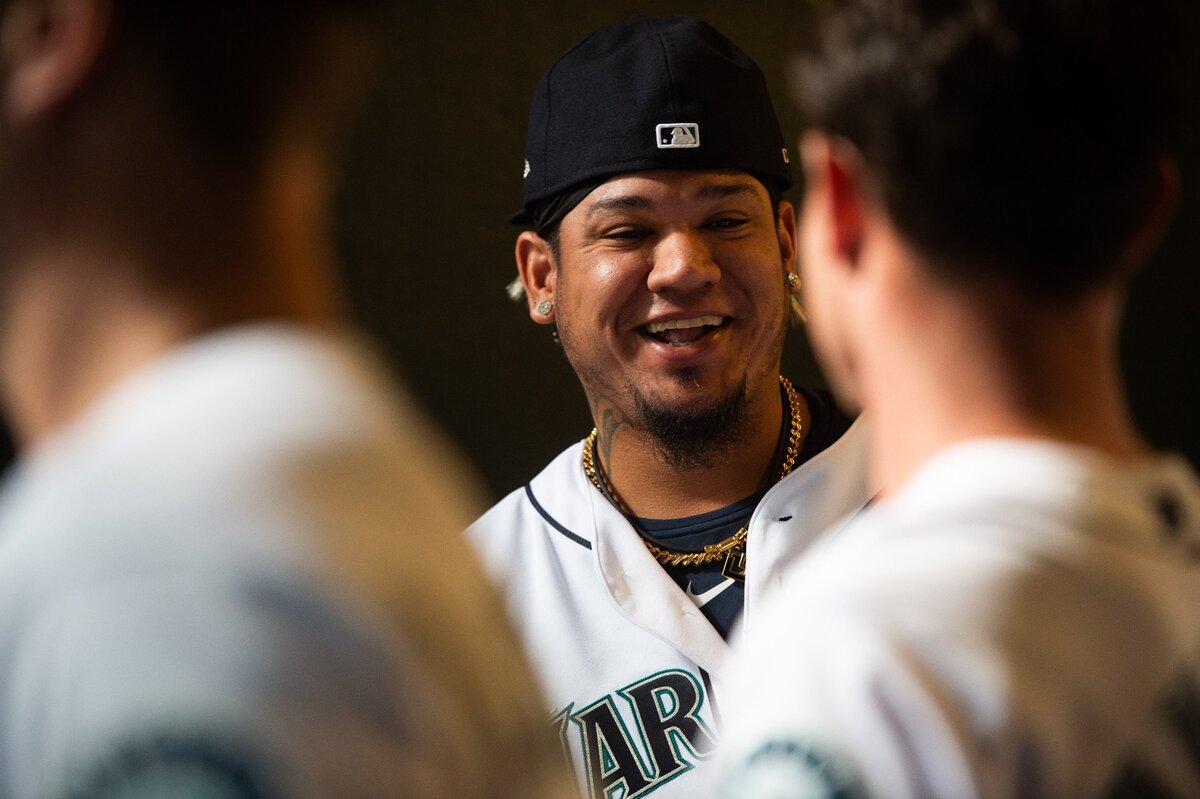 Pitcher Felix Hernandez shares a laugh with teammates before the game. The Seattle Mariners played the Boston Red Sox in a Major League Baseball game at T-Mobile Park in Seattle, Wash., on Thursday, March 28, 2019.