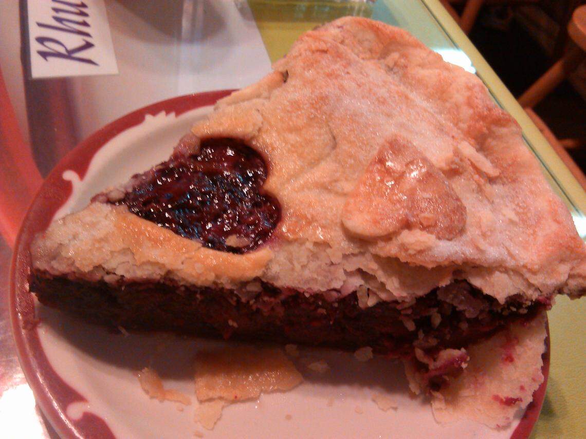 A slice of pie with a heart-shaped cutout in the crust. Berryland Cafe was known for its berry and rhubarb pies.