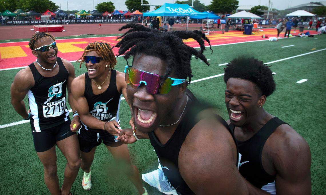 Spanaway Lake 400-meter relay team of Jermaine Brousssard, Trishion Sullivan, D’Aryhian Clemons and Charles McQueen celebrate after taking the 3A state championship during the final day of the WIAA State Track and Field Championships at Mount Tahoma High School in Tacoma, Washington on Saturday, May 28, 2022.