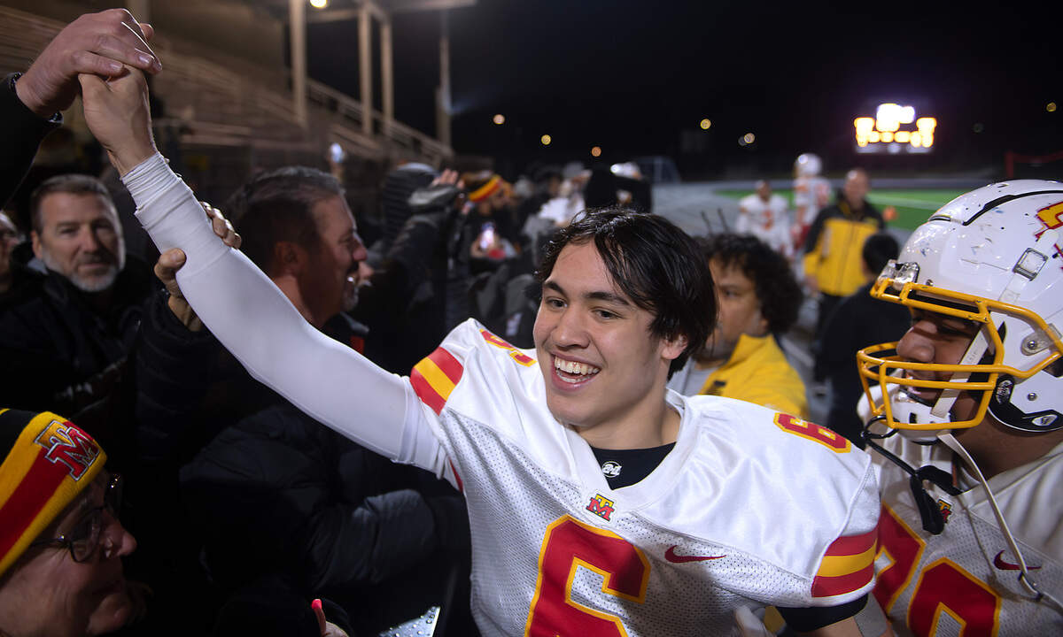 Mount Tahoma quarterback Damarion Sawyer celebrates with fans following Friday night’s state football playoff game against the Decatur Golden Gators at Federal Way Memorial Stadium in Federal Way, Washington, on Nov. 15, 2024. Mount Tahoma won the game, 23-21.