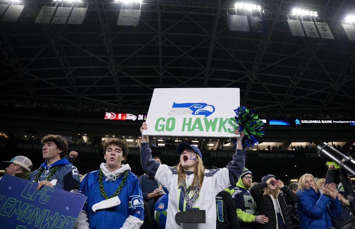 Fans cheer during the second quarter the NFC Divisional Round game between the Seattle Seahawks and the San Francisco 49ers at Lumen Field, on Saturday, Jan. 17, 2026, in Seattle.