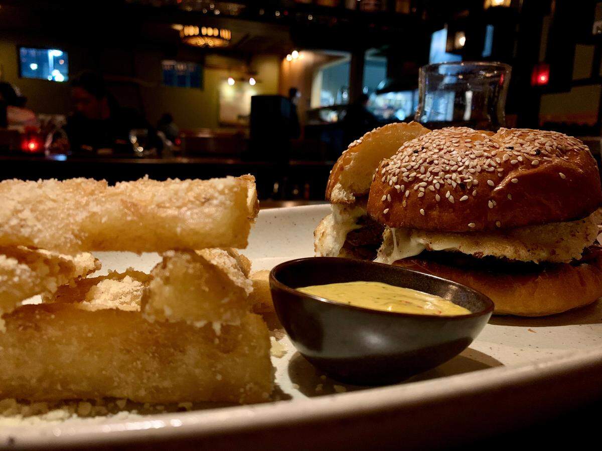 Asado offers more than a dozen dishes at half-off during two daily happy hours, including the house sirloin and chorizo burger with yucca fries.