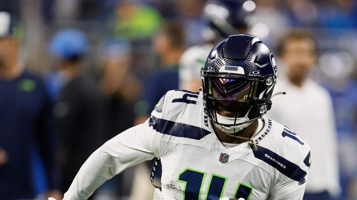 Seattle Seahawks wide receiver DK Metcalf warms up before an NFL football game against the Detroit Lions, Sunday, Sept. 17, 2023, in Detroit. (AP Photo/Duane Burleson)