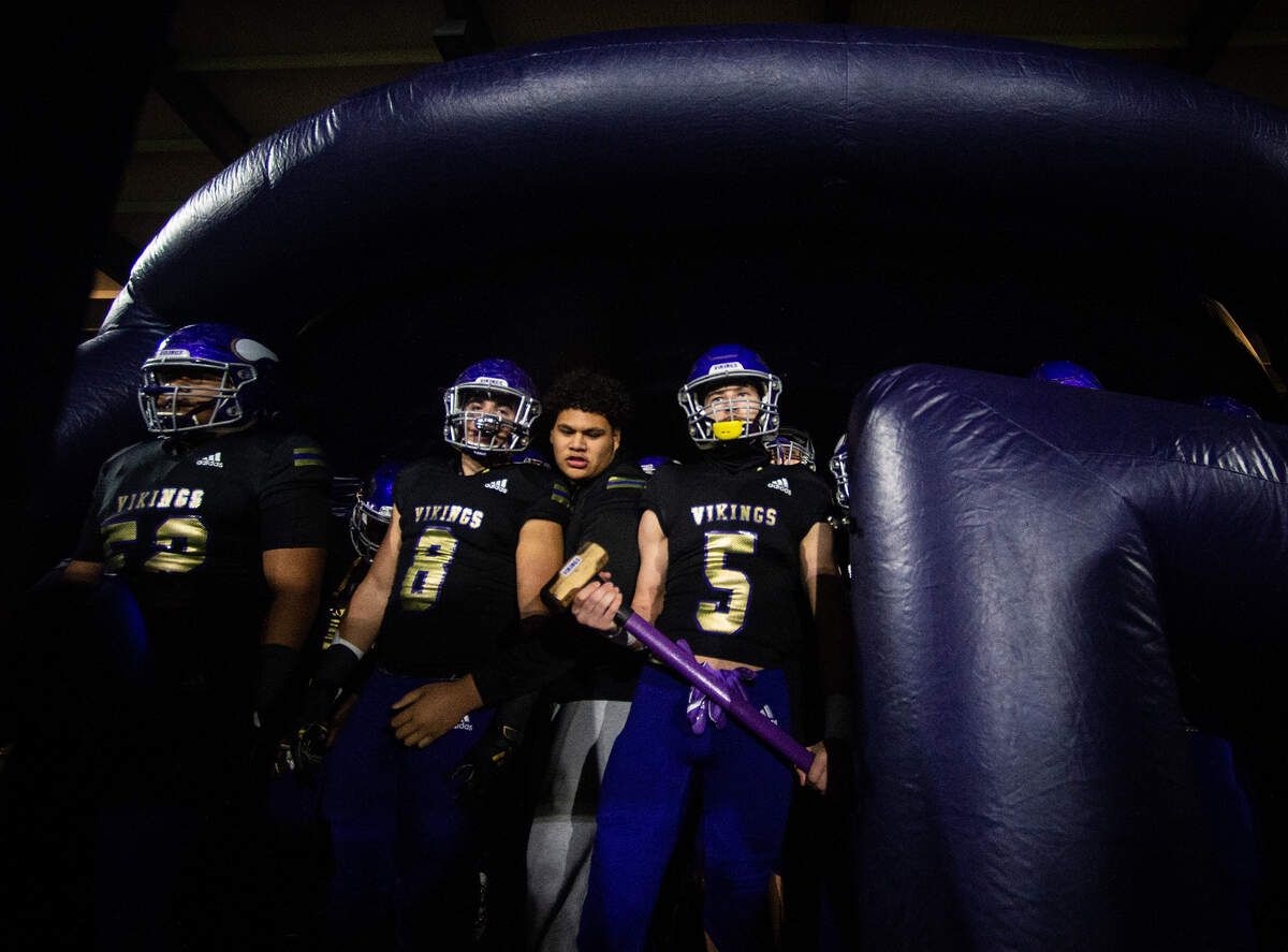 The Puyallup Vikings stand in their tunnel before the start of the game. Puyallup played Auburn Mountainview in a football game at Sparks Stadium in Puyallup, Wash., on Friday, Nov. 8, 2019.