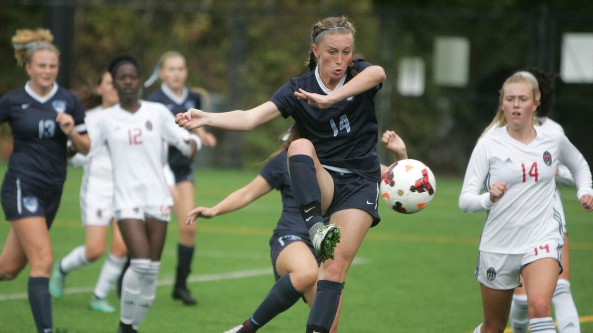 Gig Harbor’s Alyssa Gray attempts a volley against Union on Saturday at Gig Harbor High. Gig Harbor won, 2-1.