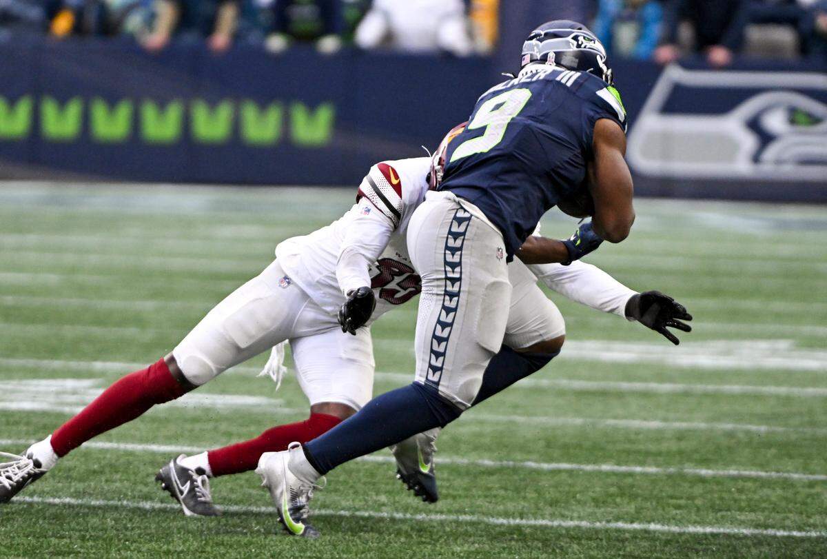 Seattle Seahawks running back Kenneth Walker III (9) runs in a 64-yard reception for a touchdown during the third quarter of the game against the Washington Commanders at Lumen Field, on Sunday, Nov. 12, 2023, in Seattle.