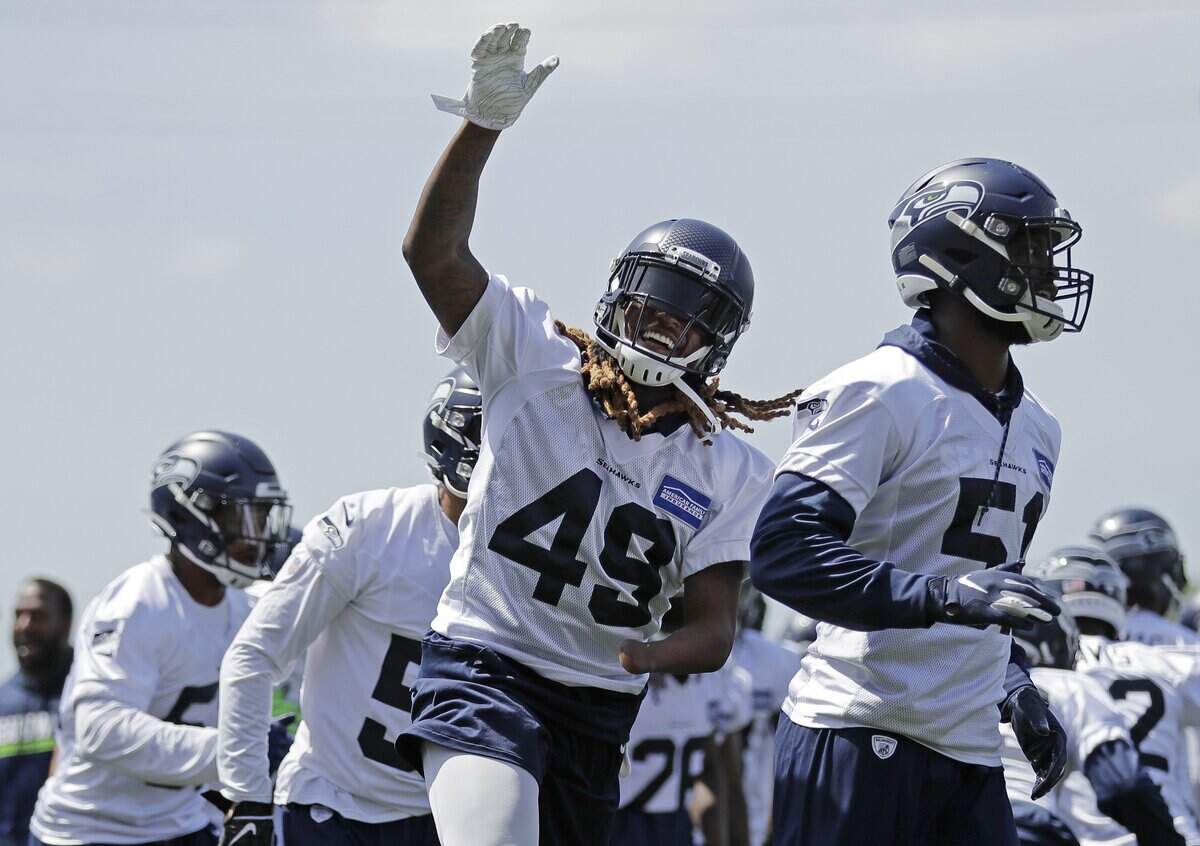 Seahawks linebacker Shaquem Griffin (49) having his usual fun Tuesday during the eighth of 10 practices of organized team activities at team headquarters in Renton.