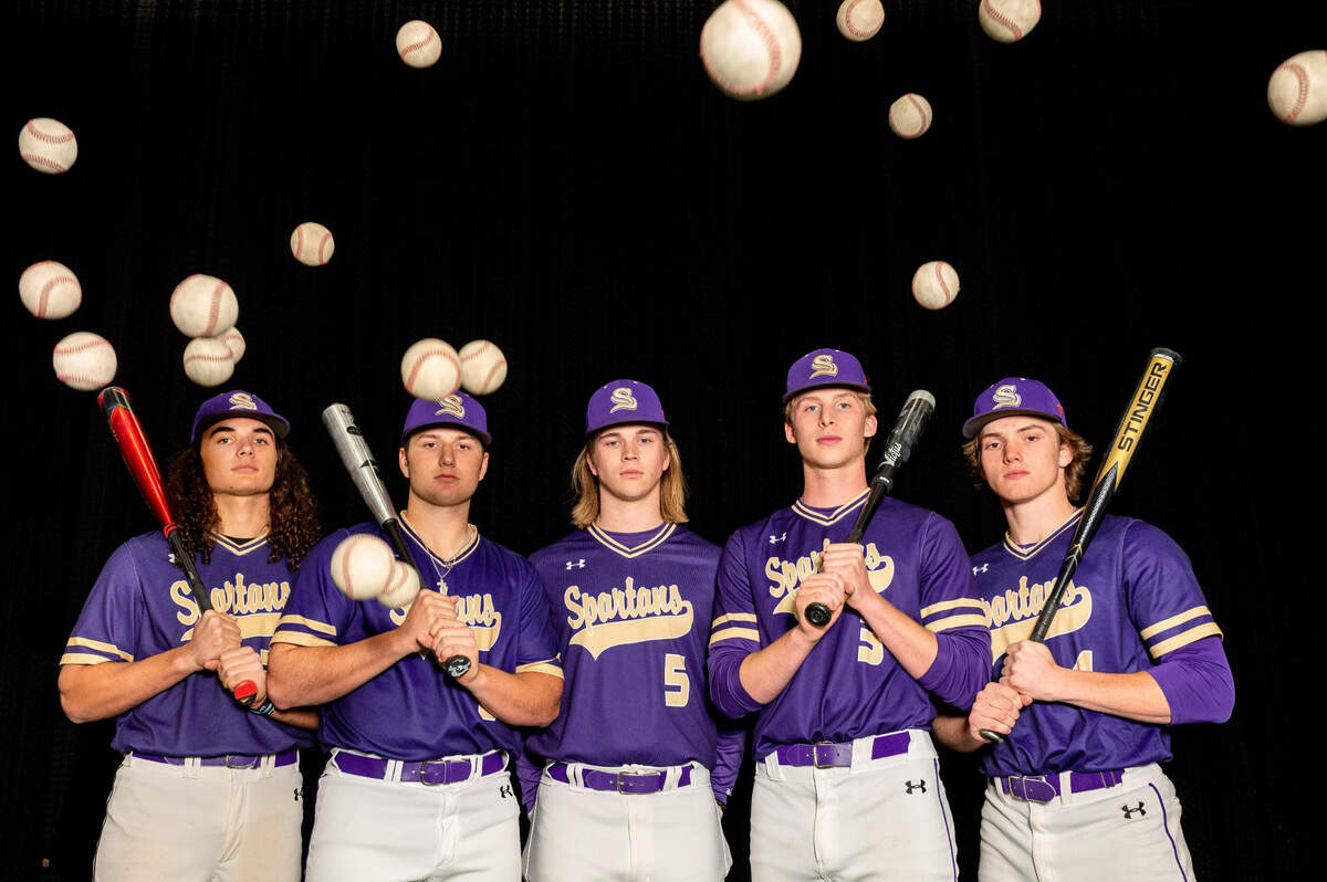Sumner ballplayers (from left): Jay Mentink, Jake Gallagher, Elijah Higginbottom, Mason Kelley and Aden Dance pose for a portrait inside Diamond Sports Training Center in Puyallup, Wash., on Tuesday, April 12, 2022.