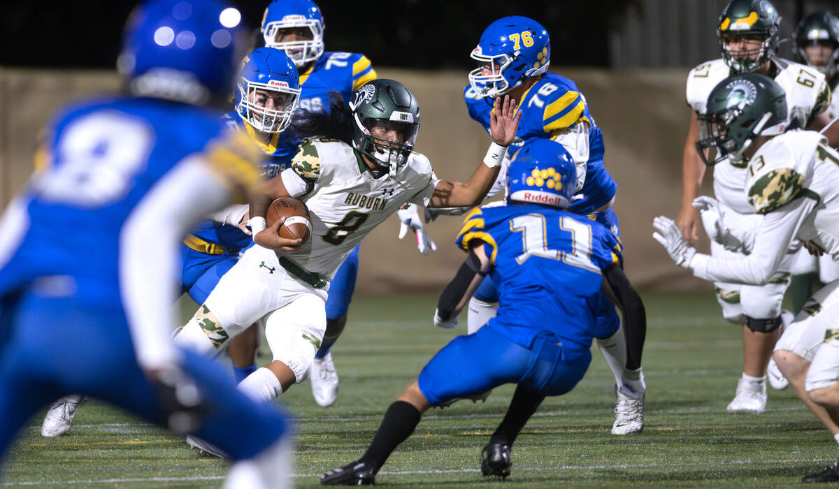 Auburn running back RJ Conlan carries the ball during Thursday night’s North Puget Sound League football game against the Stadium Tigers at Stadium High School in Tacoma, Washington, on Sept. 24, 2024.