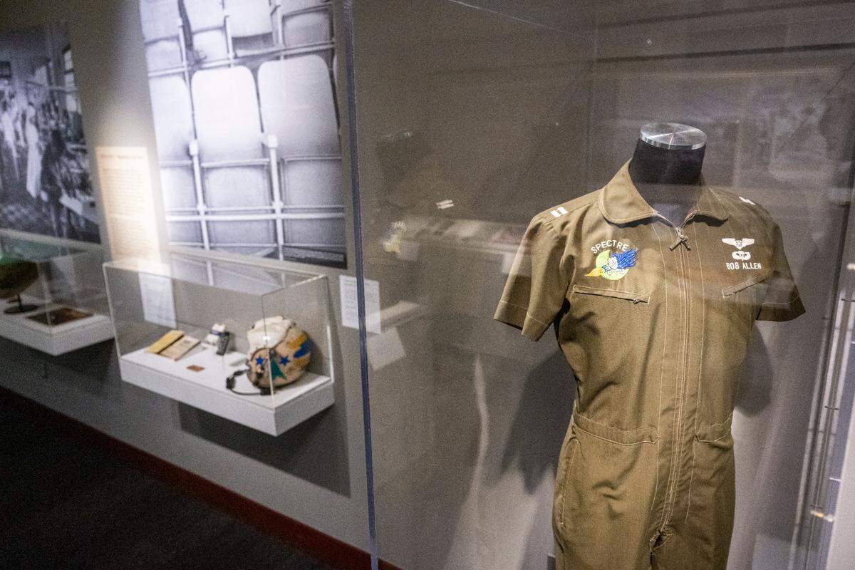 A 16th Special Operations SQ Ground Duty suit stands on display at “The Things They Brought Home,” exhibit at the Washington State History Museum on Thursday, April 24, 2025, in Tacoma. The exhibit showcases the stories of Washington’s Vietnam War veterans by displaying a collection of personal objects that people brought back from their service.