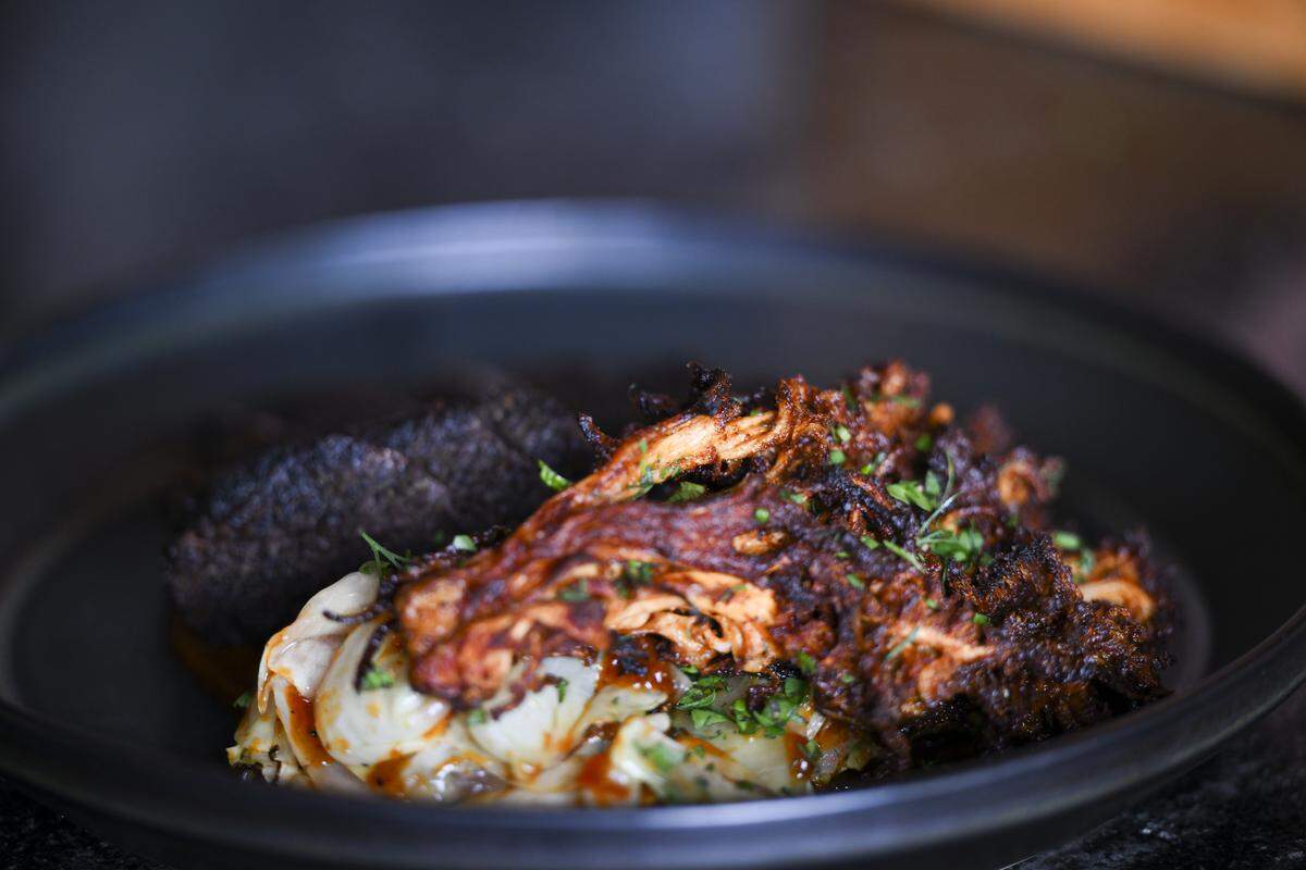 Chef Ike Hippensteel almost always features Adam’s Mushrooms at Field Bar & Bottle Shop in Tacoma. In mid-spring, he served a zabuton steak with winter cabbage, a housemade chamoy and a spiced coral mushroom roasted at high heat.