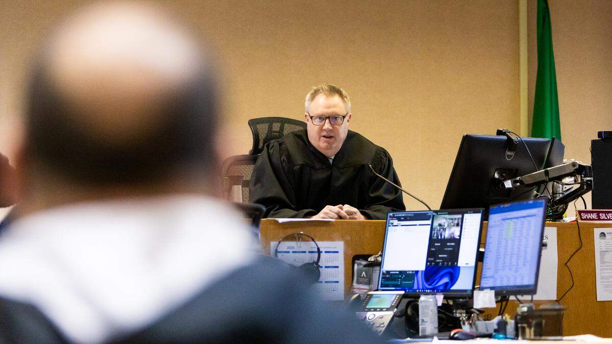 Yakima County Judge Shane Silverthorn discusses a case with a defendant at a Yakima County Jail courtroom on Tuesday, March 25, 2025 in Yakima. There were no public defenders available to represent the defendant.
