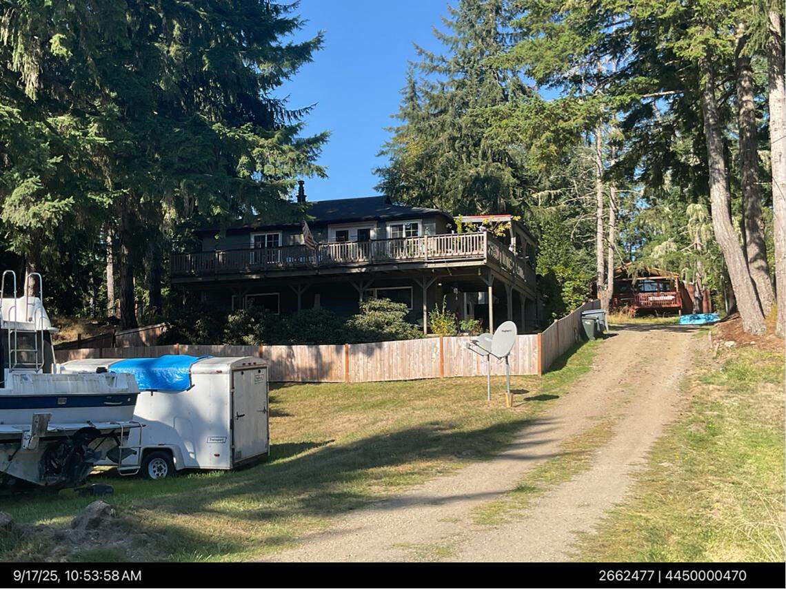 A 64-year-old woman and a 39-year-old man were found fatally stabbed Dec. 11, 2025 at this house on Herron Island. The Pierce County Sheriff’s Office arrested a 63-year-old man suspected of killing the two people Dec. 12, 2025.