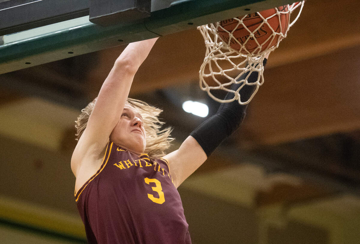 White River’s Wyatt Glissmeyer dunks during the fourth quarter. Foss played White River in a basketball game at Foss High School in Tacoma, Wash., on Friday, Jan. 31, 2020.