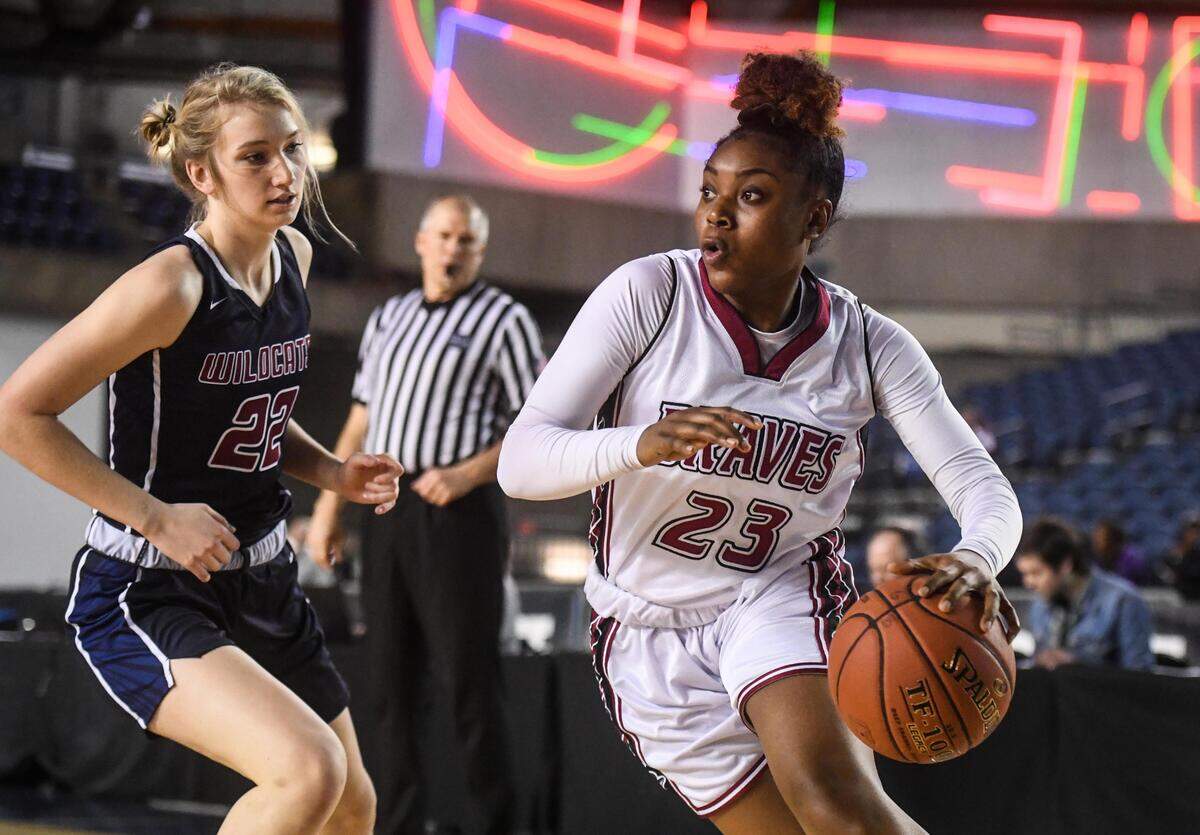 Bethel’s Tiarra Brown drives to the basket during the first quarter. Bethel played Mount Spokane in a basketball game at Hardwood Classic at the Tacoma Dome in Tacoma, Wash., on Saturday, March 7, 2020.