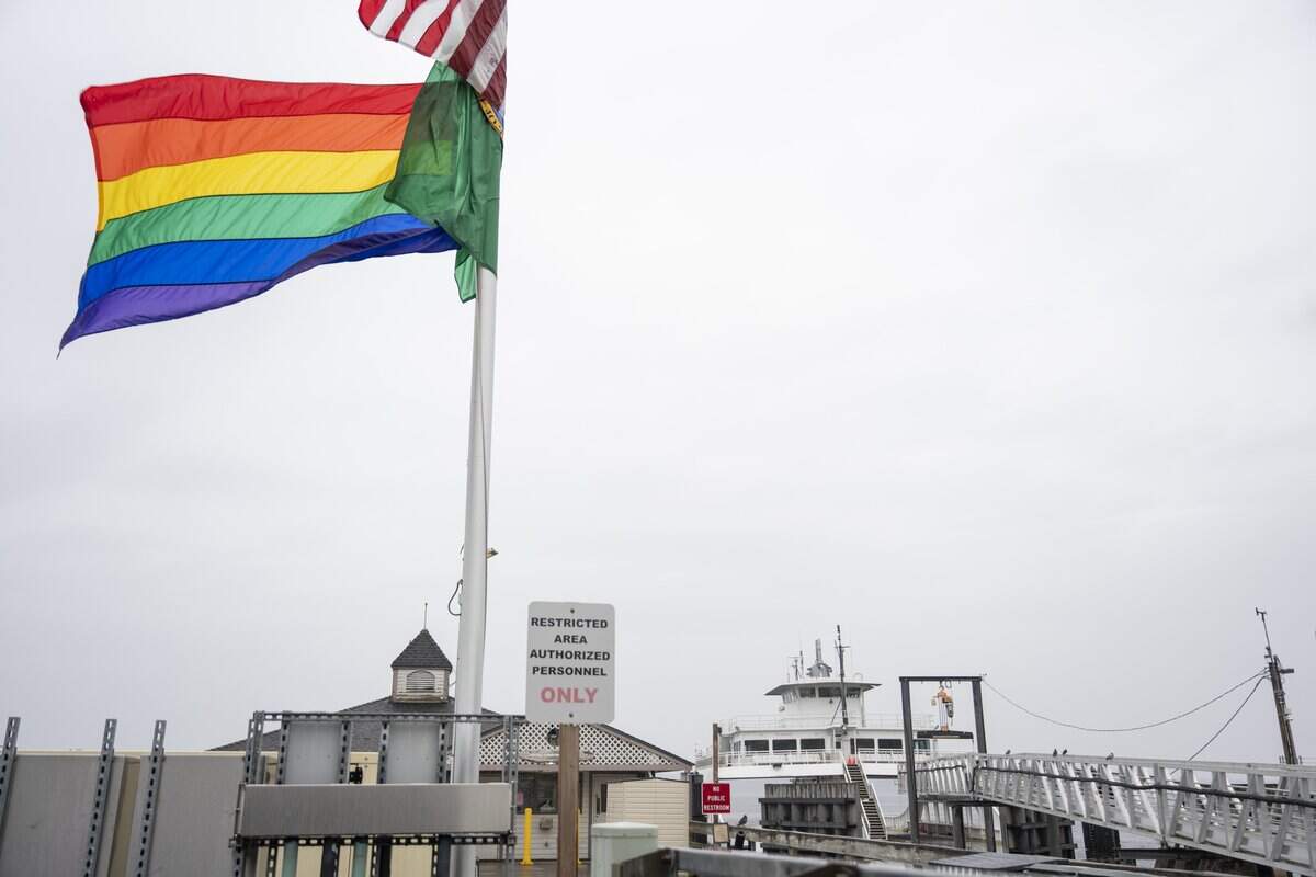 A rainbow Pride flag flies at the Steilacoom ferry terminal on Monday, June 8, 2026, in Steilacoom, Wash.
