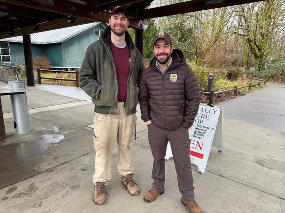 Wildlife biologist Ryan Munes and bullfrog crew lead Jamie Buchanan at Billy Frank Jr. Nisqually National Wildlife Refuge.