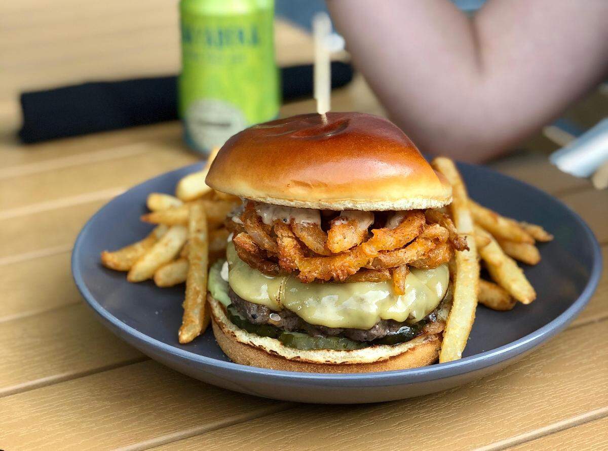Bar Bistro is offering 20% off all burgers at select times this month, including the Bacon Jam Burger, shown here.