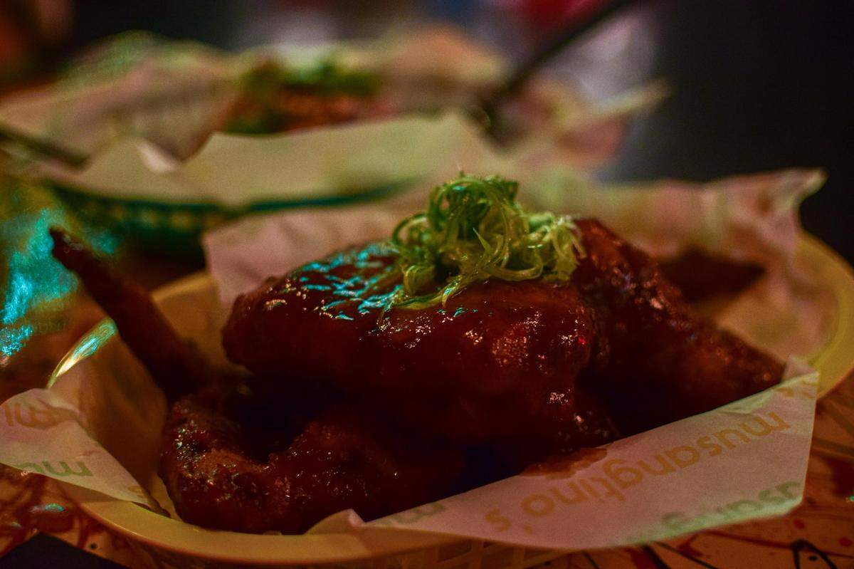 Busy Body! partnered with Melissa Miranda to bring Musangtino’s, the Seattle chef’s Filipino bar food concept, to Tacoma’s Sixth Avenue. The whole adobo wings are insanely messy but filling and packed with flavor.