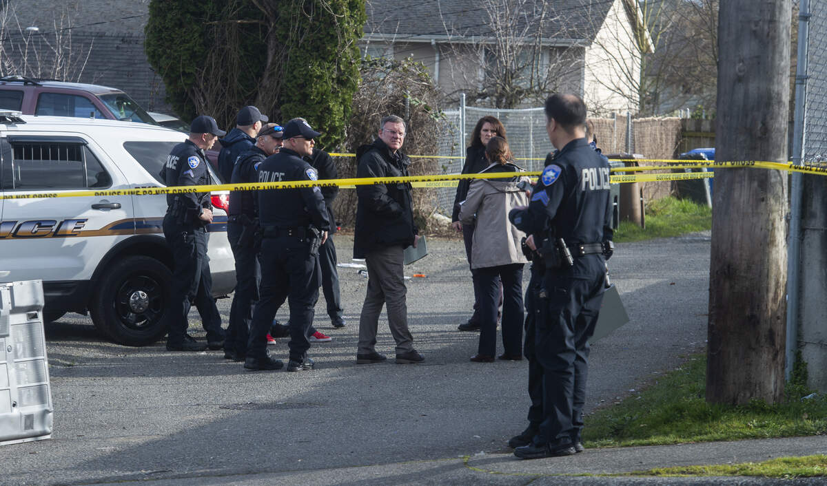 Tacoma police investigate the scene of a fatal shooting Wednesday afternoon, March 11, 2020 in Court G, an alley between South 15th and 16th streets near South Yakima Avenue. The victim, a 32-year-old man, was transported to a local hospital where he died, said Tacoma fire spokesman Joe Meinecke.