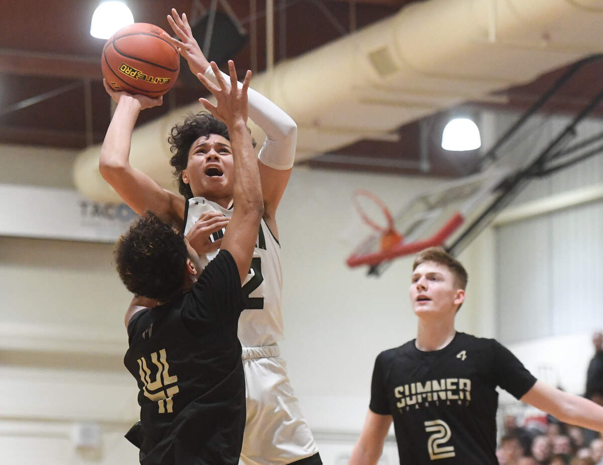 Auburn’a Maleek Arington shoots during the first quarter. Sumner played Auburn in a basketball game at Wilson High School in Tacoma, Wash., on Friday, Feb. 14, 2020.