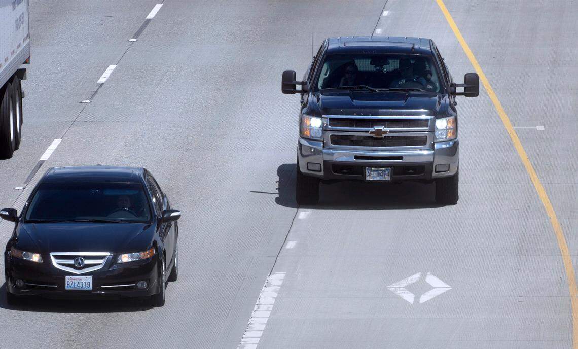 A truck drops into the HOV lane on southbound Interstate 5 in Tacoma, Washington on Thursday, June 16, 2022.