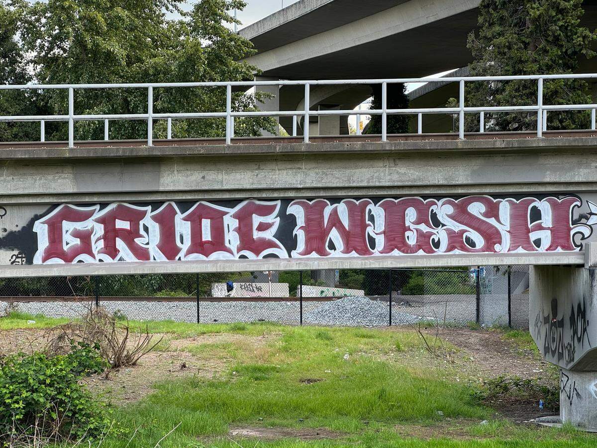 A GRIDE tag painted on a railroad trestle near Freighthouse Square.