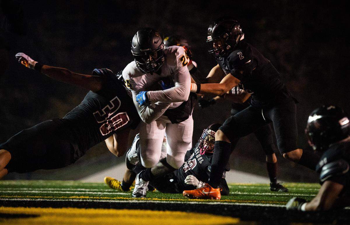 Lincoln’s Julien Simon rushes for a touchdown in the final seconds of the second quarter. Lincoln played Bethel in a a football game at the Lincoln Bowl in Tacoma, Wash., on Friday, Nov. 1, 2019.