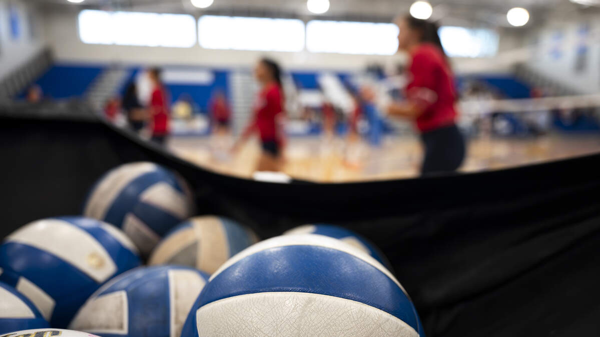 Players warm up before the volleyball match between the Kennedy Catholic Lancers and the Curtis Vikings at Curtis Senior High School, on Thursday, Sept. 18, 2025, in University Place, Wash.