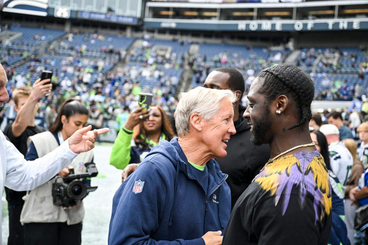 Seattle Seahawks head coach Pete Carroll hugs Jeremy Lane, cornerback of the Super Bowl champion Seahawks before the game between the Seattle Seahawks and the Carolina Panthers at Lumen Field, Sunday, Sept. 24, 2023, Seattle, Wash.