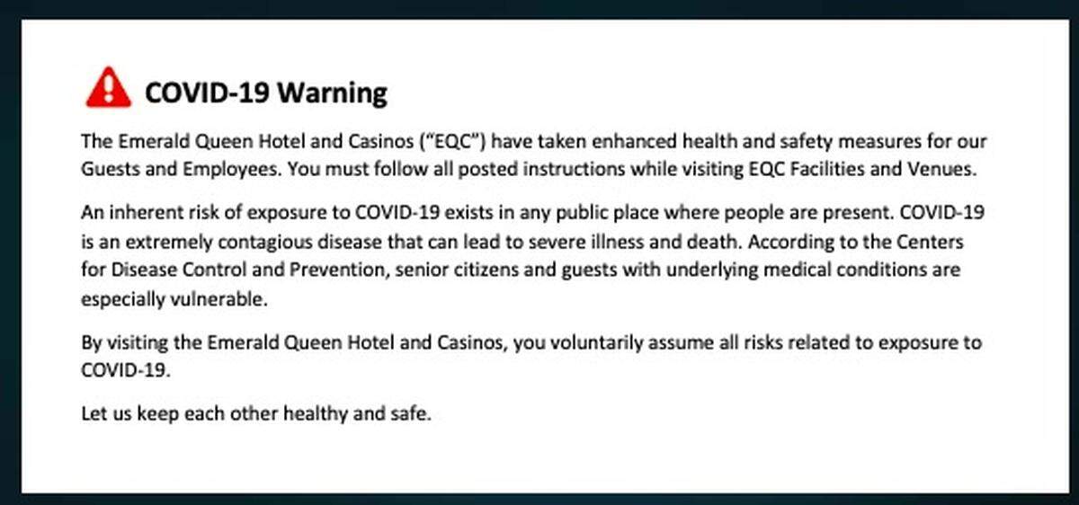 A warning appears on the Emerald Queen Casino’s website regarding COVID-19 risks in public spaces.