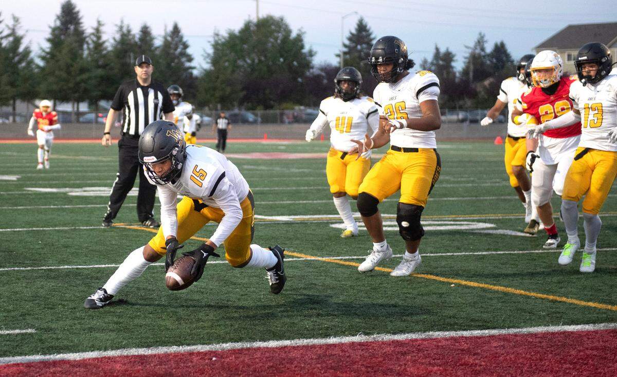 Lincoln defensive back Jamirie Pringle recovers his own blocked punt for a touchdown during Friday night’s football game against the Mount Tahoma T-Birds at Mount Tahoma High School in Tacoma, Washington, on Sept. 20, 2023. Pringle recovered the ball for an Abes touchdown. Mount Tahoma won the game, 24-20.