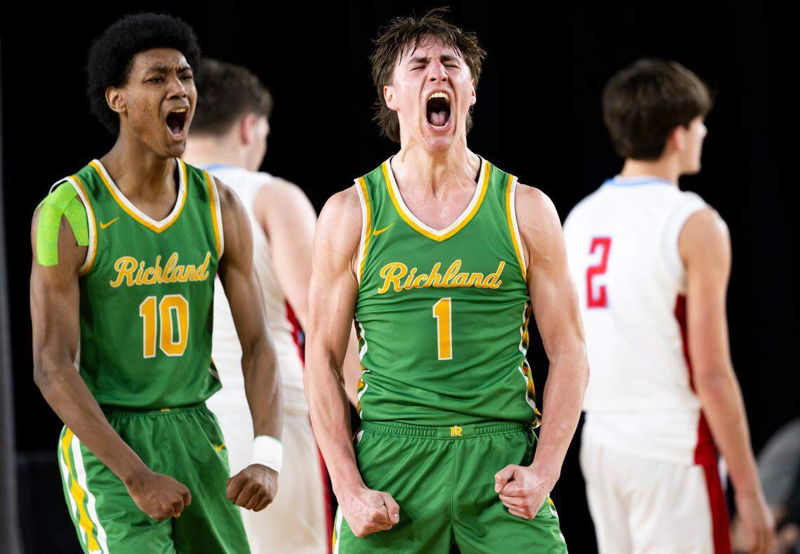 Richland’s Landon Northrop (1) reacts to an and=one attemp against West Valley during the second half of a Class 4A state basketball tournament quarterfinal game at the Tacoma Dome on Thursday, March 6, 2025, in Tacoma, Wash.