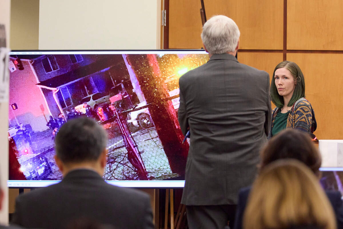 Aiyann Mallang is questioned by attorney Wayne Fricke representing officer Christopher “Shane” Burbank during the trial of Tacoma Police officers accused in the death of Manny Ellis held at Pierce County Superior Court, Thursday, Oct. 19, 2023, in Tacoma, Wash. Officers Christopher Burbank, Matthew Collins and Timothy Rankine are charged. (John Froschauer/Pool Photo AP)