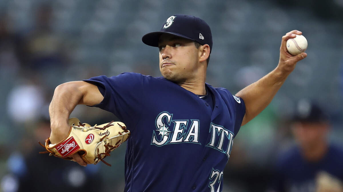 Seattle Mariners pitcher Marco Gonzales works against the Oakland Athletics in the first inning of a baseball game Monday, Aug. 13, 2018, in Oakland, Calif.