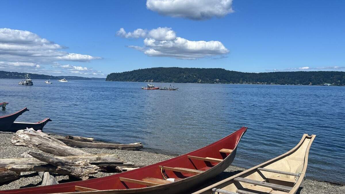 Lots of canoes lined the shores of Owen Beach on Wednesday, July 31, 2024.