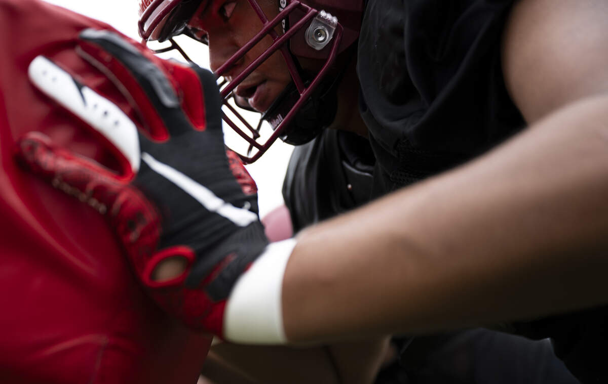 Bethel tight end Elijah Muliufi pushes the sled during a football practice at Bethel High School on Wednesday, Aug. 27, 2025, in Spanaway, Wash.